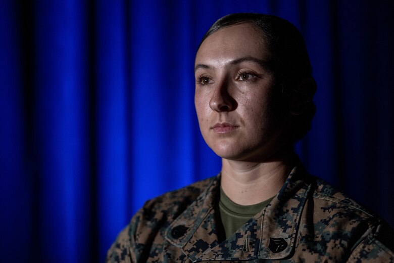 U.S. Marine Staff Sgt. Jessica Larsen, the 1st Marine Division Band drum major, instructs band members during rehearsal at Marine Corps Base Camp Pendleton, California, Jan. 24, 2023. Larsen’s first duty station was at the Blue Diamond as a lance corporal saxophone instrumentalist, and now after three years as a drill instructor, she has returned for a second tour. Larsen is a native of Saint Donatus, Iowa.  (U.S. Marine Corps photo by Cpl. Cameron Hermanet)