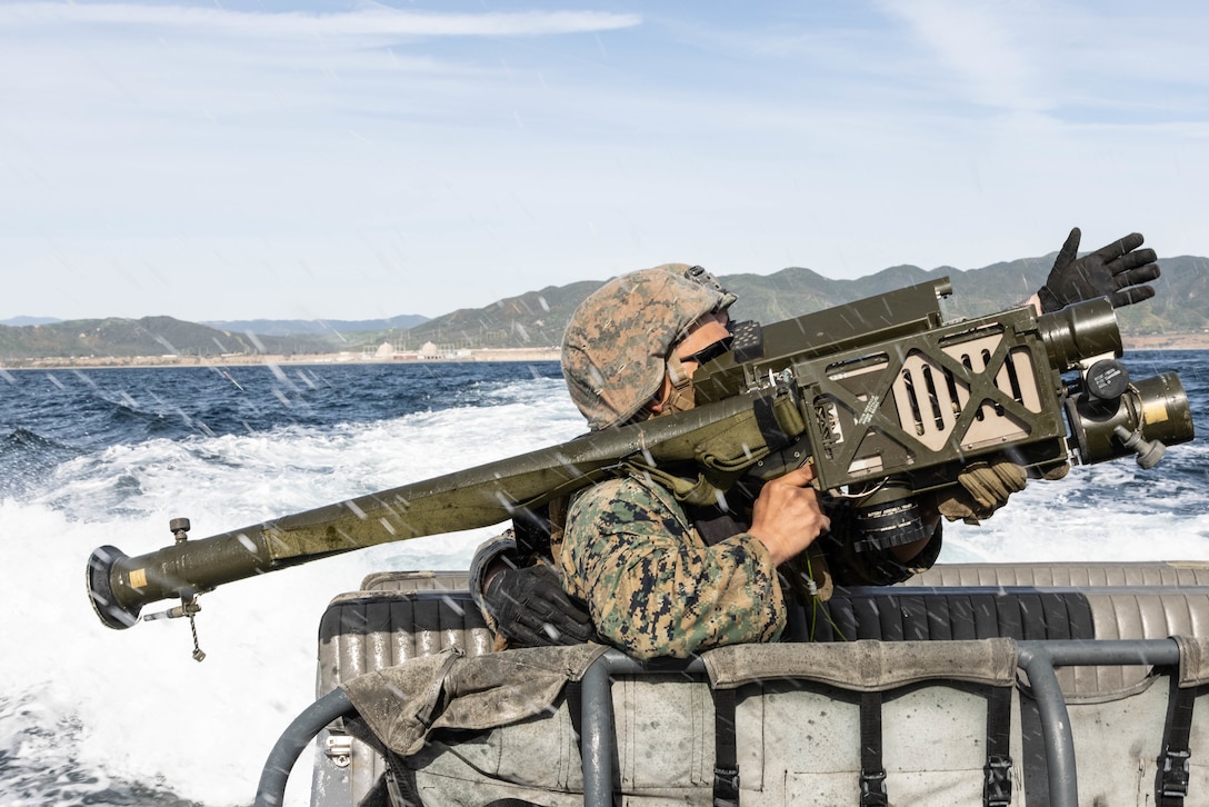 U.S. Marines with 3rd Low Altitude Air Defense Battalion, Marine Air Control Group 38, 3rd Marine Aircraft Wing, fire a training round from an FIM-92 Stinger surface-to-air missile at an RQ-20 Puma during anti-aircraft training off the coast of Marine Corps Base Camp Pendleton, California, Feb. 16, 2023. The Marines conducted the training to enhance the battalion’s defensive air operations in littoral and maritime domains. (U.S. Marine Corps photo by Cpl. Hermanet)