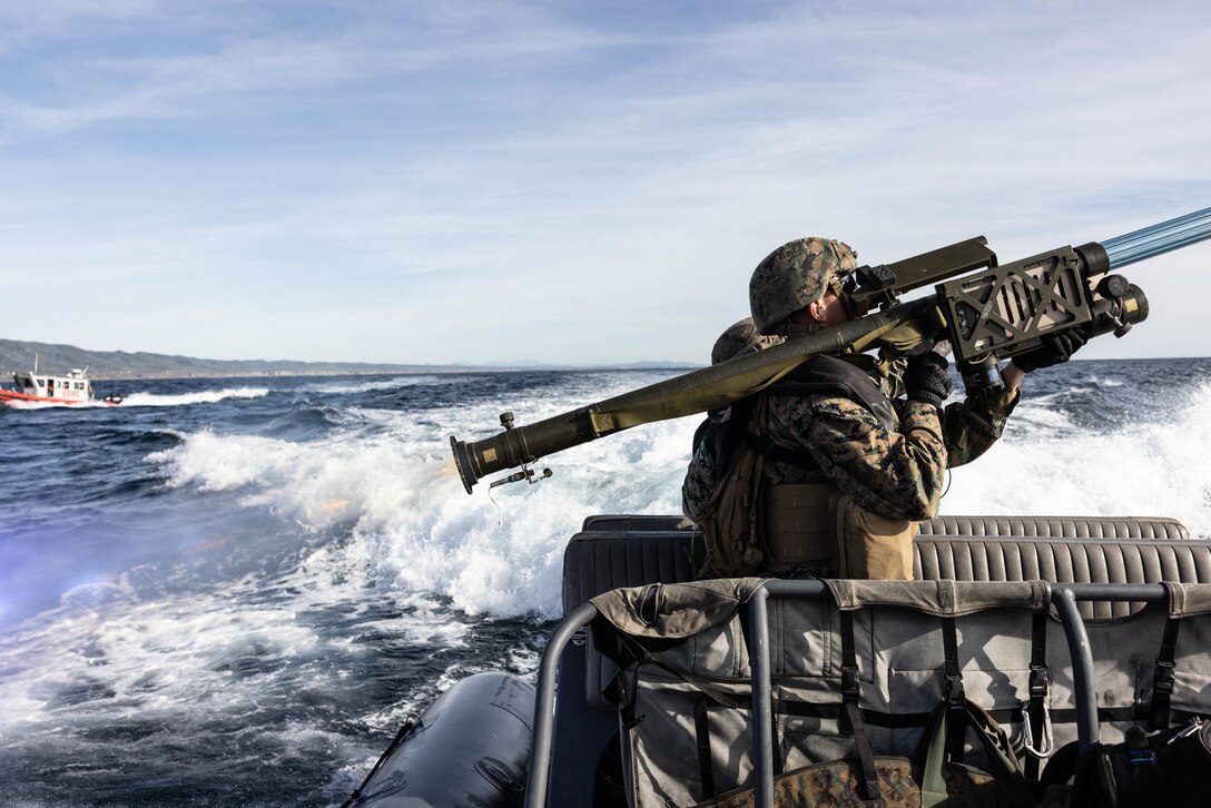 U.S. Marines with 3rd Low Altitude Air Defense Battalion, Marine Air Control Group 38, 3rd Marine Aircraft Wing, fire a training round from an FIM-92 Stinger surface-to-air missile at an RQ-20 Puma during anti-aircraft training off the coast of Marine Corps Base Camp Pendleton, California, Feb. 16, 2023. The Marines conducted the training to enhance the battalion’s defensive air operations in littoral and maritime domains. (U.S. Marine Corps photo by Cpl. Hermanet)