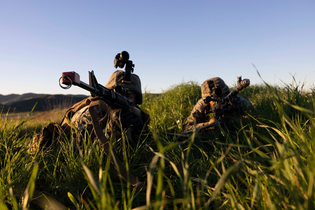 U.S. Marines with Marine Wing Support Squadron 373, Marine Air Control Group 38, 3rd Marine Aircraft Wing, post security for a Forward Arming and Refueling Point during the Aviation Ground Support (AGS) Leadership Course on Camp Pendleton, California, Feb. 8, 2023. Marines in the course trained for and demonstrated capabilities across the six activities of AGS: forward arming and refueling, airbase ground defense, airfield damage repair, aircraft salvage and recovery, base recovery after attack, and airfield operations. This course is designed to equip noncommissioned officers in AGS units with the knowledge and experience to be technically proficient, and develop them as strong, effective leaders. Cochrane is a Cleveland native and Hart is Houston native. (U.S. Marine Corps photo by Sgt. Woodward)