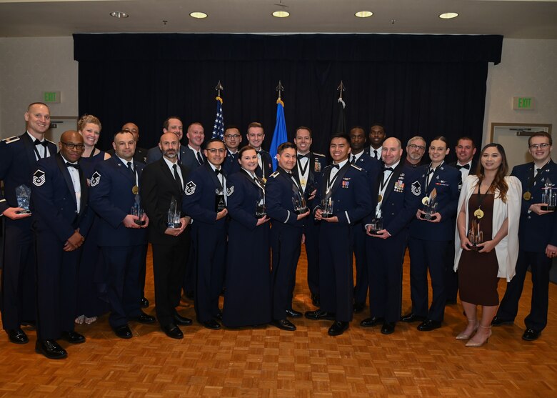 Winners of the Space Launch Delta 30 Annual Awards ceremony pose for a picture together at the Pacific Coast Club on Vandenberg Space Force Base, Calif., Feb. 16, 2023. Airmen, Guardians, and civilian employees were honored and recognized for their hard work in their communities and work centers. (U.S. Space Force photo by Airman 1st Class Ryan Quijas)
