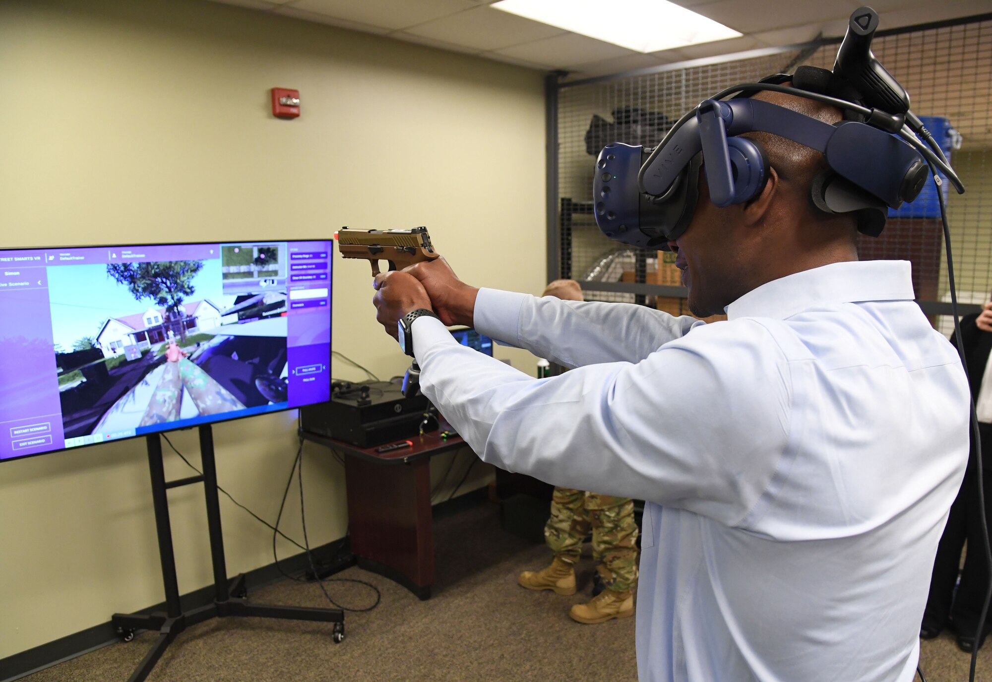 Dr. Cedric Bradley, Mississippi Gulf Coast Harrison County Campus vice president, participates in an 81st Security Forces Squadron virtual reality demonstration at Keesler Air Force Base, Mississippi, Feb. 17, 2023.