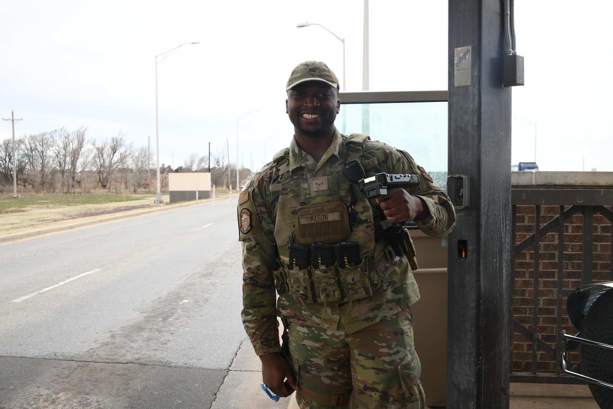 U.S. Air Force Airman 1st Class Michael Mason, 97th Security Forces Squadron patrolman, poses for a photo at Altus Air Force Base, Oklahoma, Feb. 21, 2023. As a patrolman, part of Mason’s duty is to be the base’s first line of defense against security threats.. (U.S. Air Force photo by Airman 1st Class Miyah Gray)