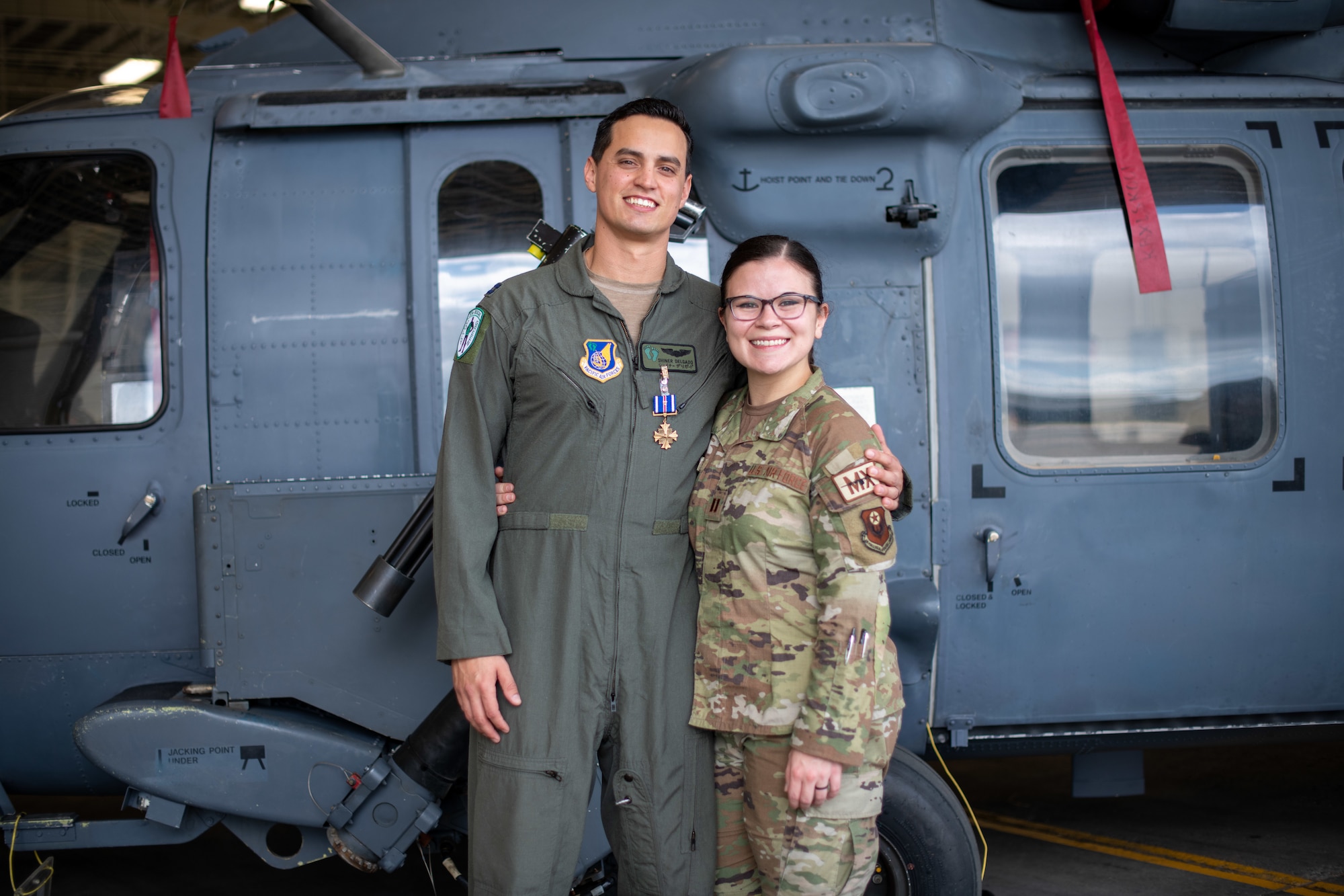 Airmen pose for a photo.