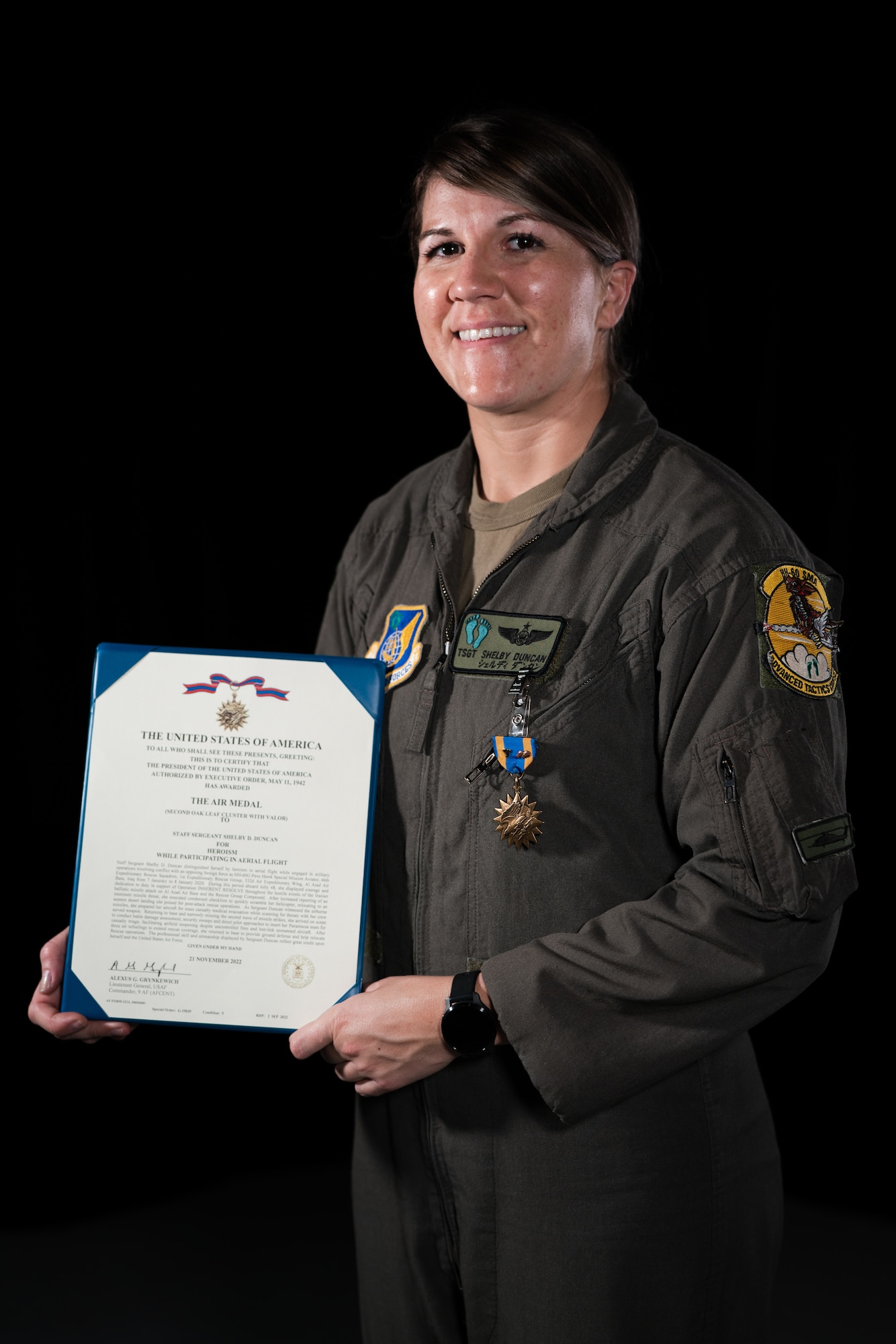 An Airman poses for a photo.