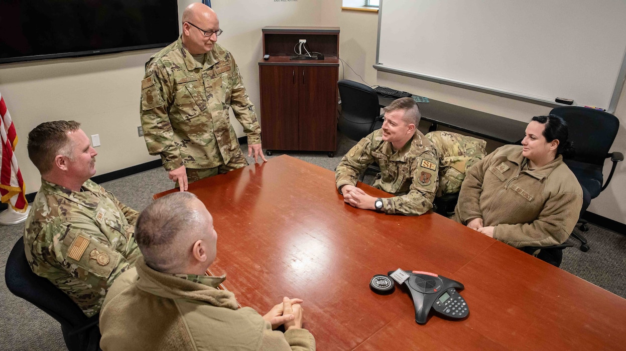 Air Force Sergeants talk to one another