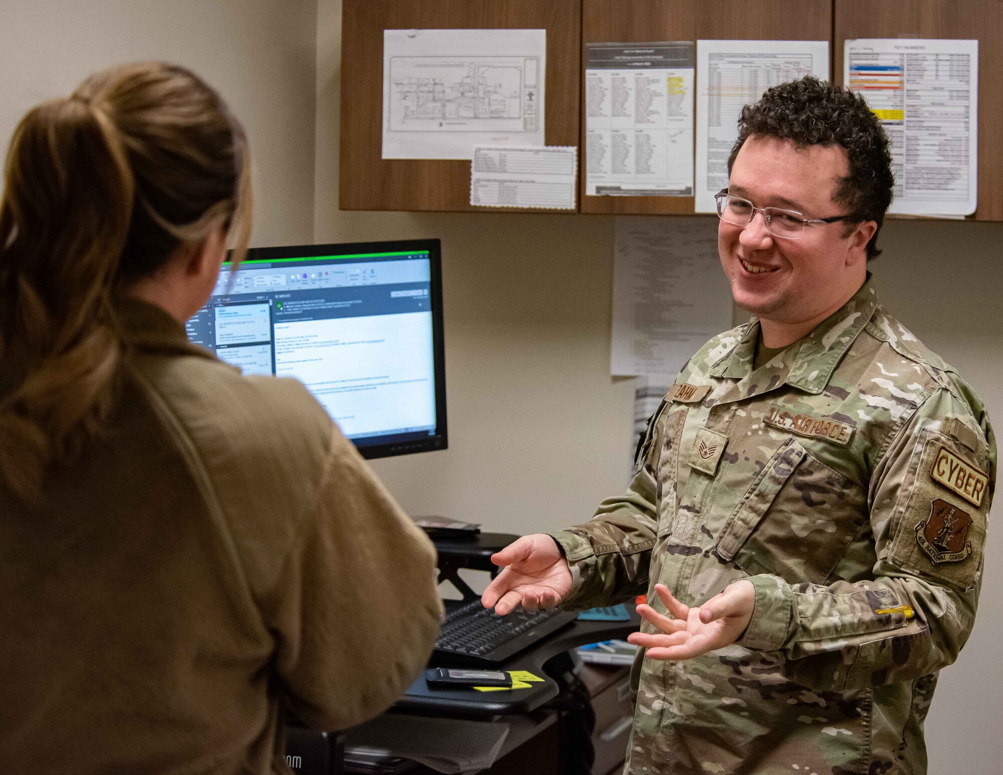 Air Force Sergeants talk to one another