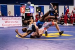 20022-N-XK513-1611
NAVAL BASE KITSAP, Wa. (Feb. 22, 2020) - Army Spc Alejandro Sancho (bottom) rolls his opponent during the Greco-Roman event during the final round of the 2020 Armed Forces Sports Wrestling Championship at the Bremeton Fitness Complex on Feb. 22. (U.S. Navy Photo by Mass Communication Specialist 1st Class Ian Carver/RELEASED).