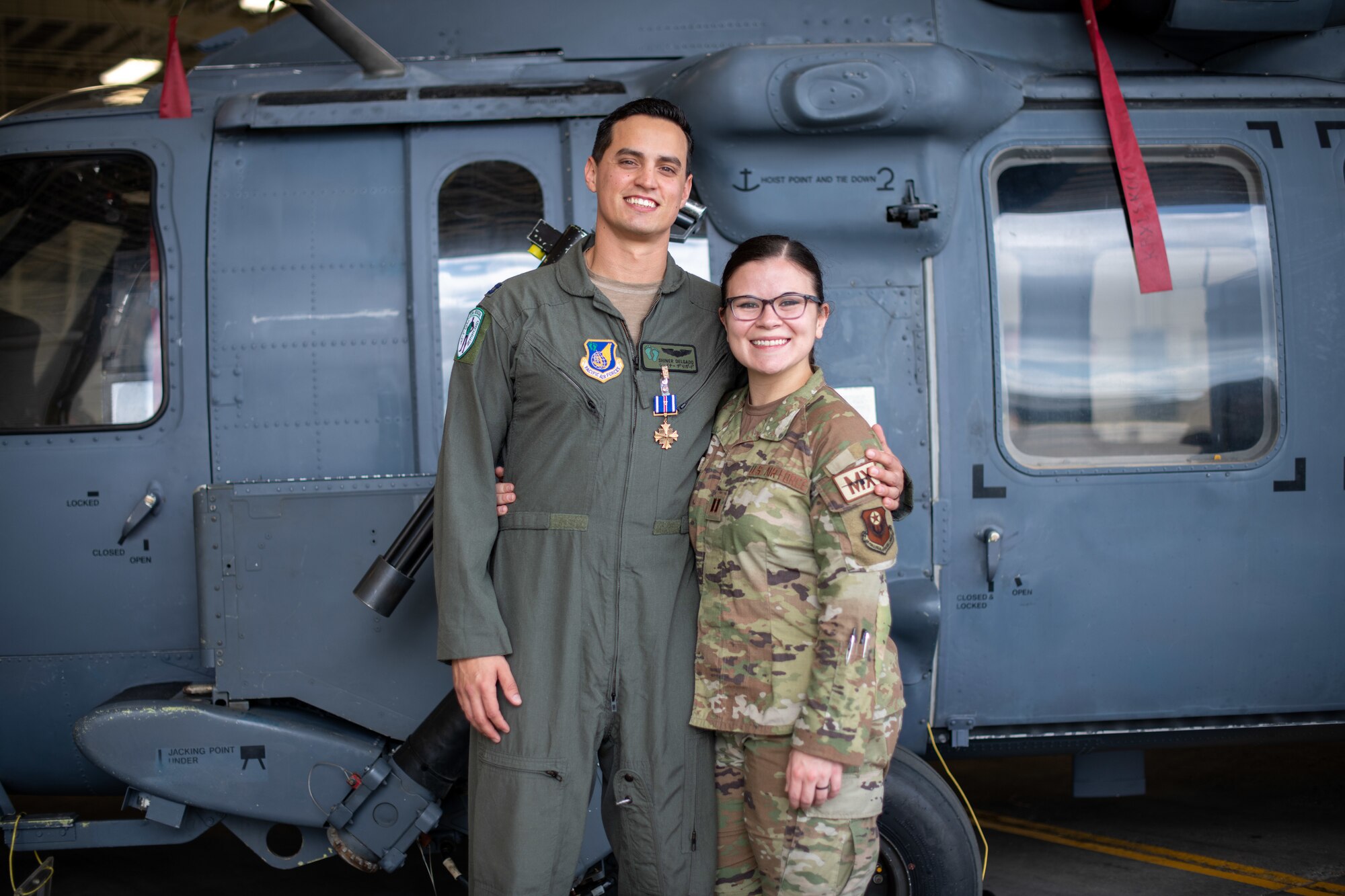 Airmen pose for a photo.