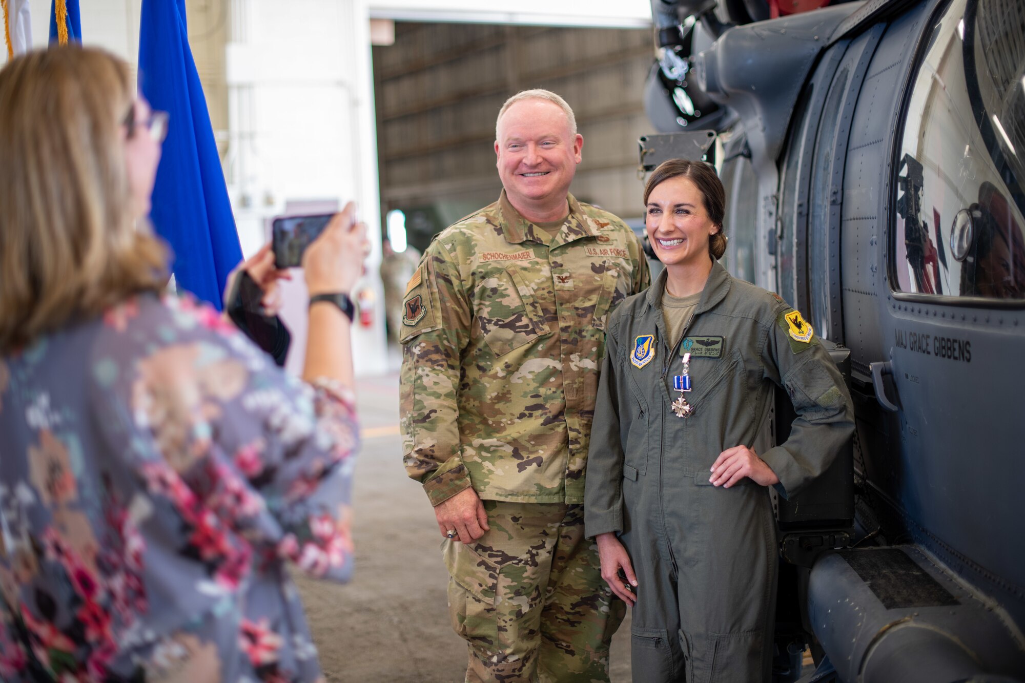 Airmen pose for a photo.