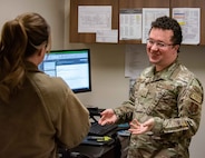 Air Force Sergeants talk to one another