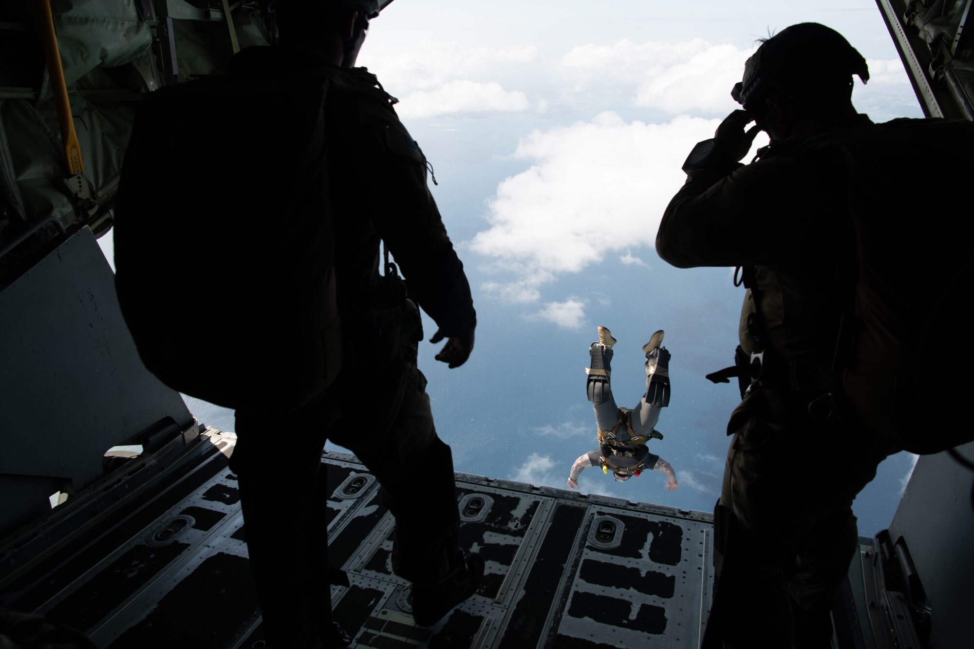 An Airman jumps out of an aircraft.