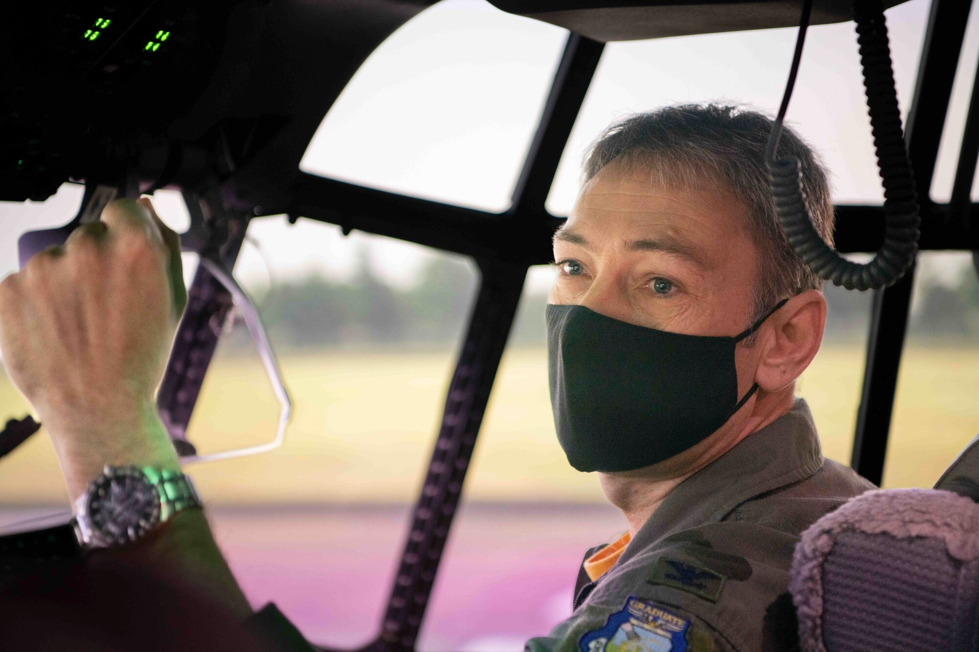 Col. Andrew Roddan, 374th Airlift Wing commander, prepares a C-130J Super Hercules simulator for takeoff, during a community engagement event at Yokota Air Base, Japan, Feb. 17, 2023.