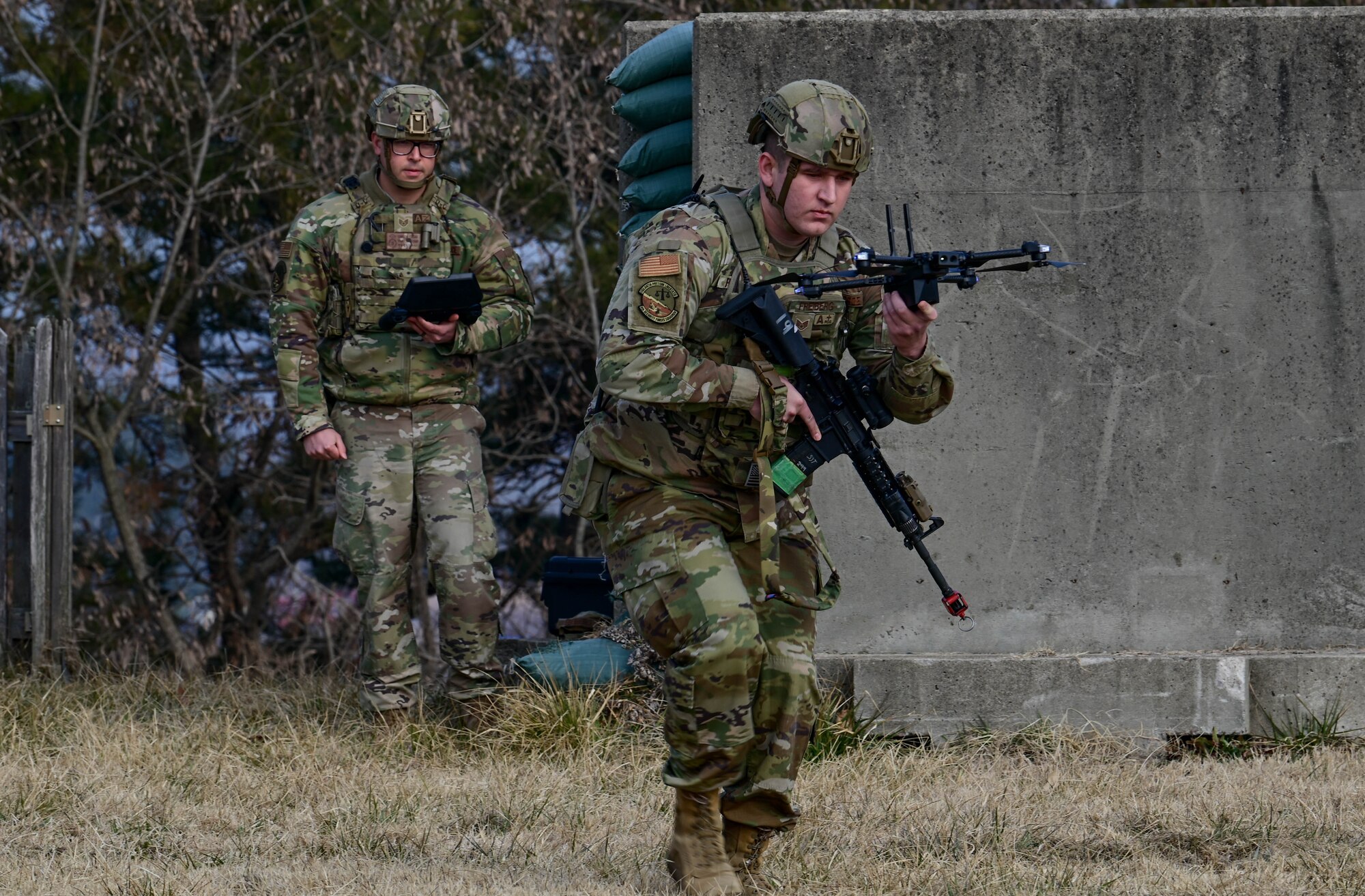 Airmen with the 8th Security Forces Squadron prepare for a small, unmanned aircraft system (sUAS) demonstration during the Wolf Leadership Forum, at Kunsan Air Base, Republic of Korea, Feb. 23, 2023. The demo highlighted their expanded capabilities with the sUAS. (U.S. Air Force photo by Senior Airman Shannon Braaten)