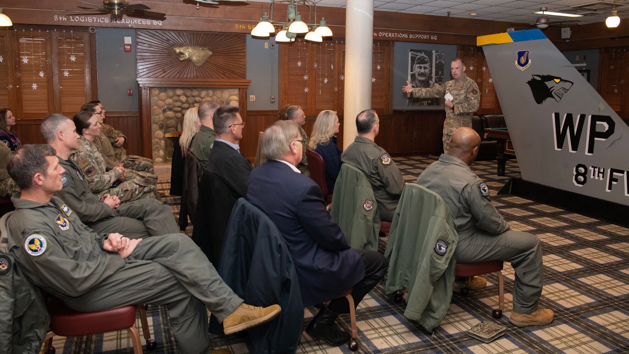 U.S. Air Force Maj. Brock McNabb, 8th Healthcare Operations Squadron mental health flight commander, speaks to an audience at Kunsan Air Base, Republic of Korea, Feb. 24, 2023. McNabb discussed an innovative way to deliver mental care to the Wolf Pack. (U.S. Air Force photo by Senior Airman Akeem K. Campbell)