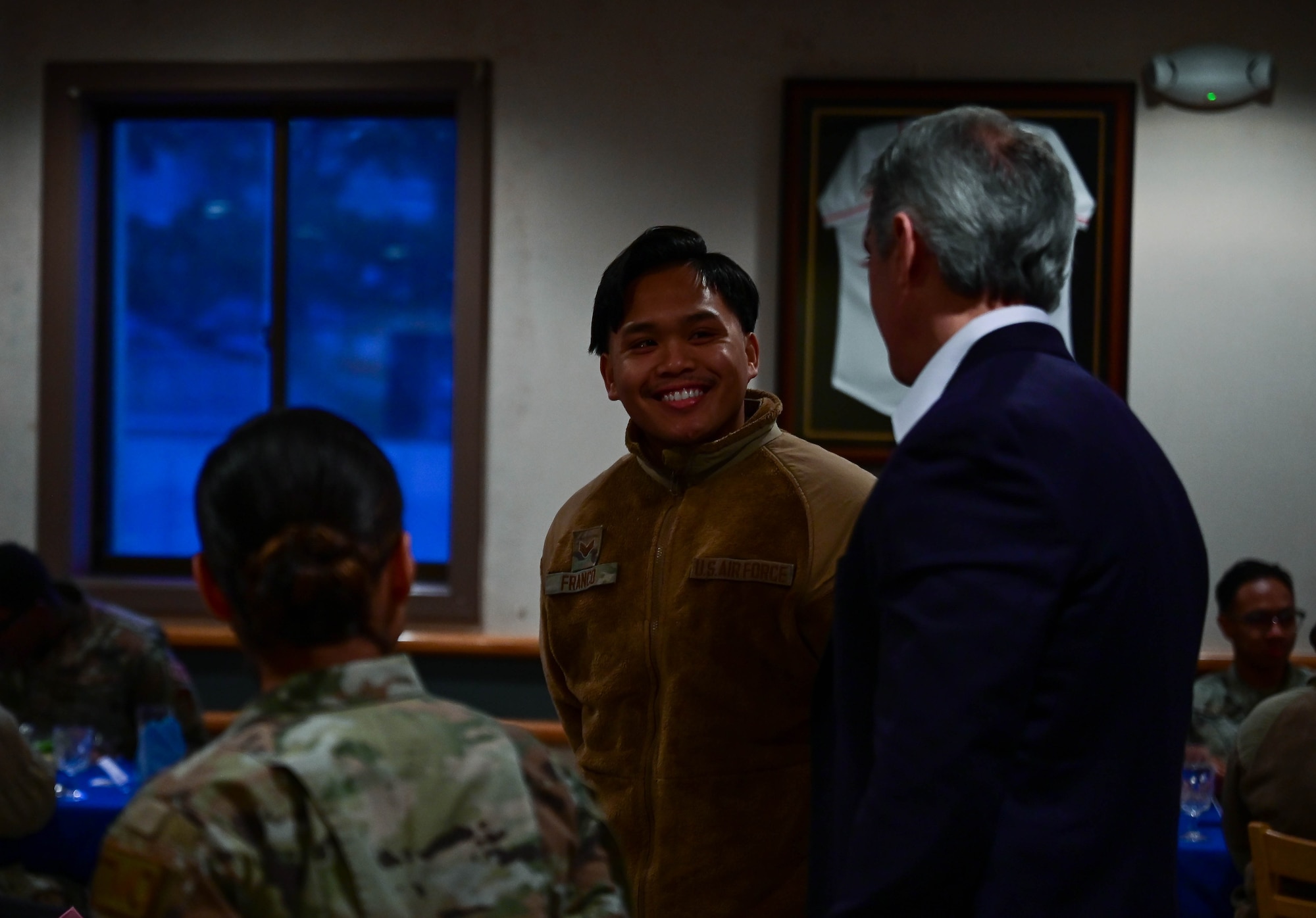 An Airman (center) speaks with Retired Brig. Gen. Jeremy Sloane, ‘Wolf’ class of 2015-2016, during the Wolf Pack Leadership Forum at Kunsan Air Base, Republic of Korea, Feb. 23, 2023. The forum immersed visiting leaders in the Wolf Pack mission while allowing them to share their experiences and knowledge with them. (U.S. Air Force photo by Senior Airman Shannon Braaten)