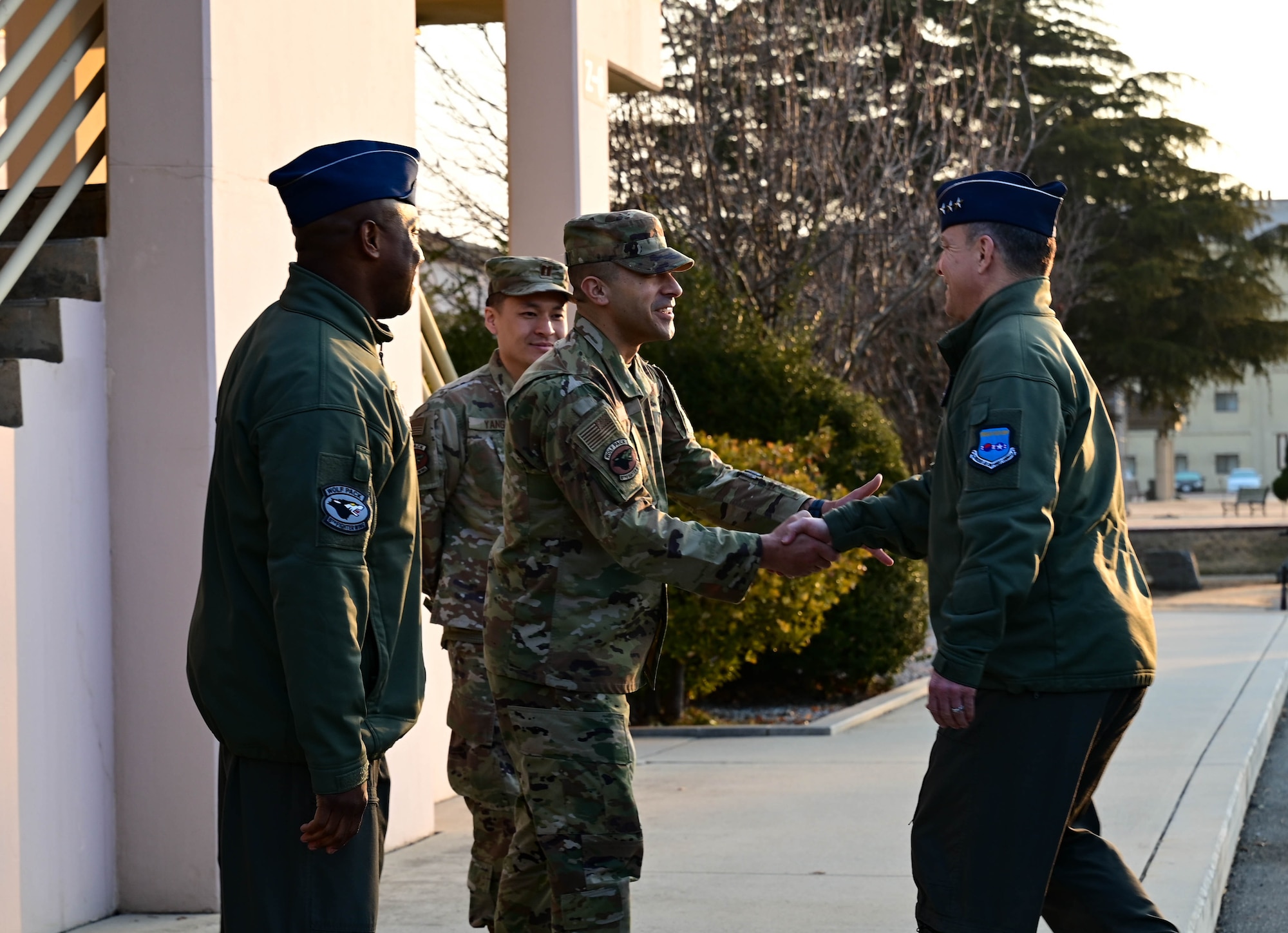 Chief Master Sgt. Carlos “Wolf Chief” Damian (left), 8th Fighter Wing command chief, shakes hands with Lt. Gen. Scott “Rolls” Pleus, 7th Air Force commander, during the Wolf Leadership Forum at Kunsan Air Base, Republic of Korea, Feb. 23, 2023. As part of the Wolf Leadership Forum, former leaders of Kunsan Air Base returned to visit and learn about how the Wolf Pack currently operates. (U.S. Air Force photo by Senior Airman Shannon Braaten)