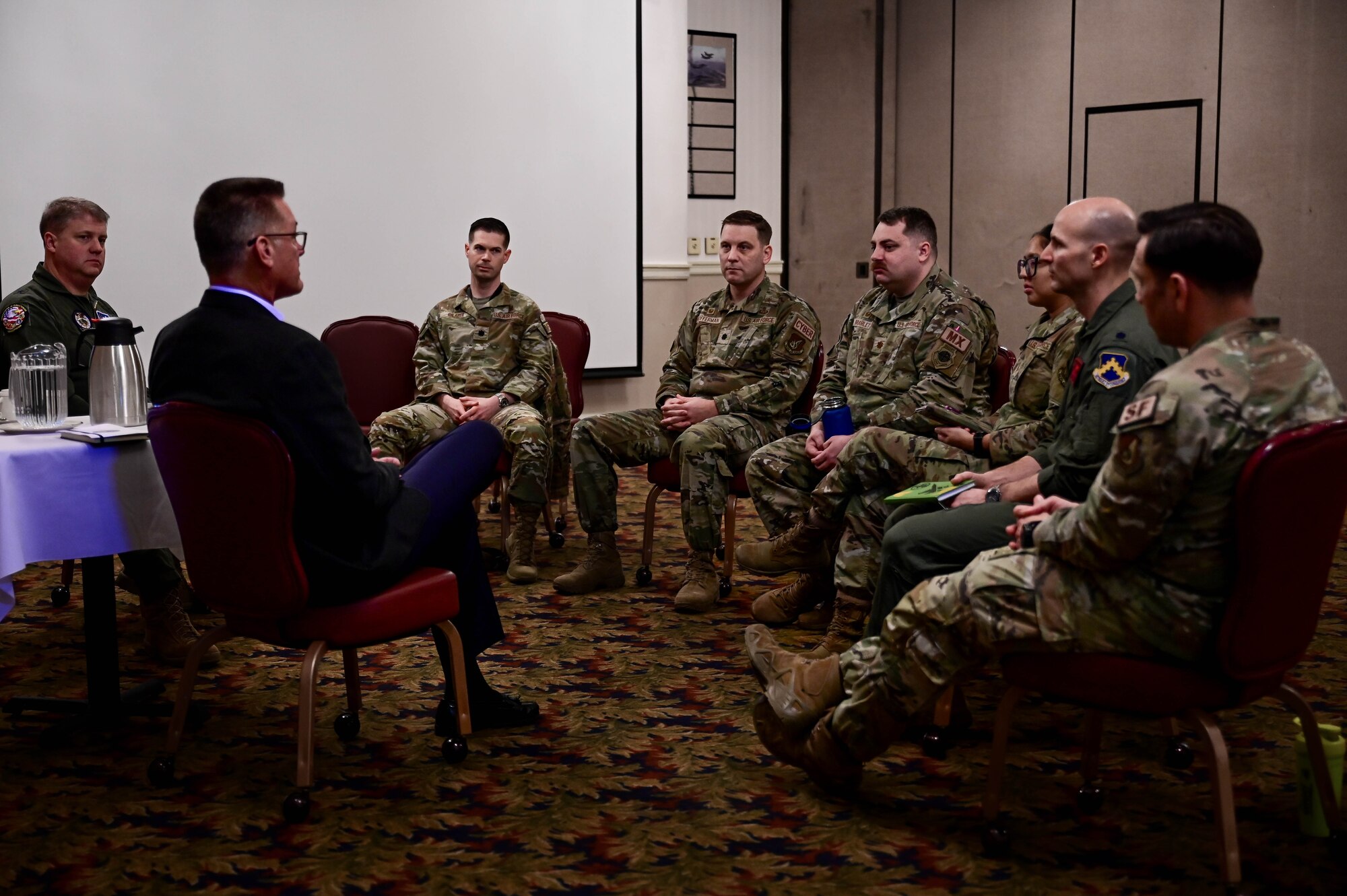 Airmen listen as Brig. Gen. David Shoemaker (left), U.S. Indo-Pacific Command director of operations, and retired Maj. Gen. Brian Bishop, speak at a panel during the Wolf Leadership Forum at Kunsan Air Base, Republic of Korea, Feb. 23, 2023. Over the course of the two-day event, leaders were briefed on the 8th Fighter Wing’s current priorities while engaging with subject matter experts from various mission sets. (U.S. Air Force photo by Senior Airman Shannon Braaten)