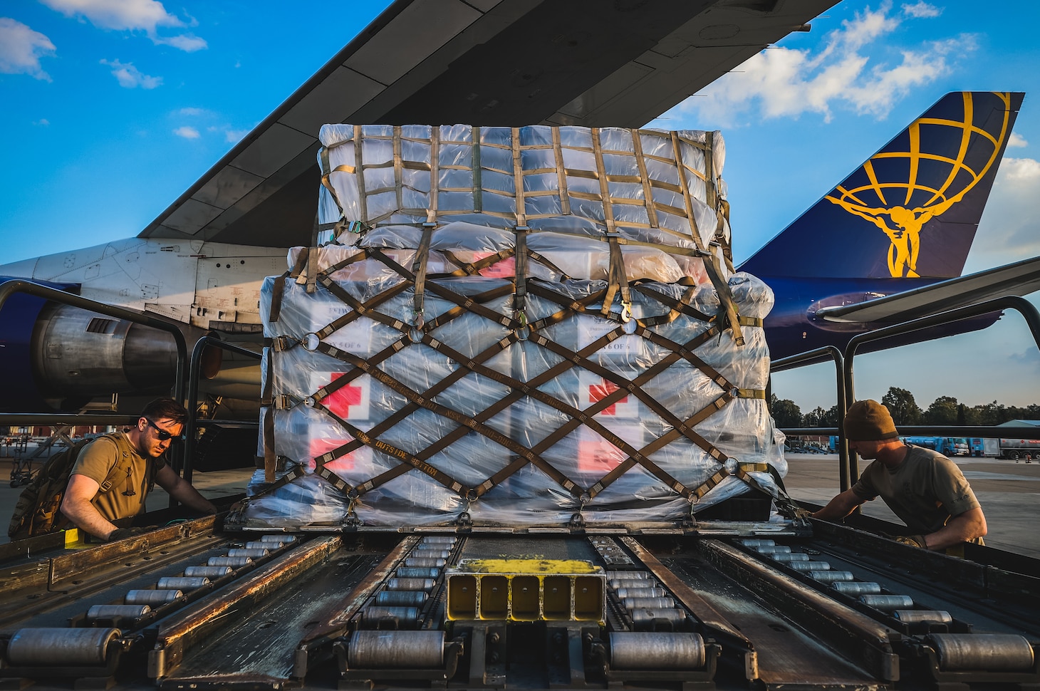 U.S. Air Force Airmen assigned to Incirlik Air Base offload tents to aid the victims of the devastating earthquakes in Türkiye at Incirlik Air Base, Türkiye, Feb. 22, 2023. The field hospital was delivered by a C-17 aircraft from Joint Base Langley-Eustis in Virginia to Incirlik on February 22.