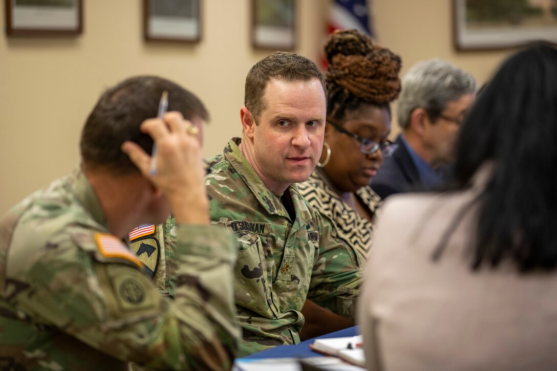 Maj. Ian O’Sullivan, Deputy Commander for the Mega Projects Division of the U.S. Army Corps of Engineers Galveston District, speaks during an executive governance meeting for the Orange County Project portion of the Sabine Pass to Galveston Bay (S2G) Coastal Storm Risk Management Program at the Orange County Drainage District office.