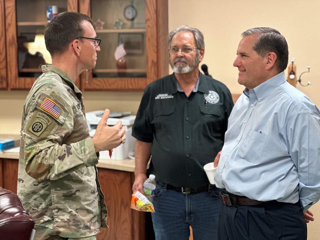 Col. Rhett Blackmon, Commander of the U.S. Army Corps of Engineers (USACE) Galveston District, left, speaks with Kirk Roccaforte, Orange County Commissioner Precinct 3 and Gulf Coast Protection District Board of Directors Member, middle, and Don Carona, Executive Manager of Special Projects for the Orange County Drainage District (OCDD), after an executive governance meeting for the Orange County Project portion of the Sabine Pass to Galveston Bay (S2G) Coastal Storm Risk Management Program at the Orange County Drainage District office.