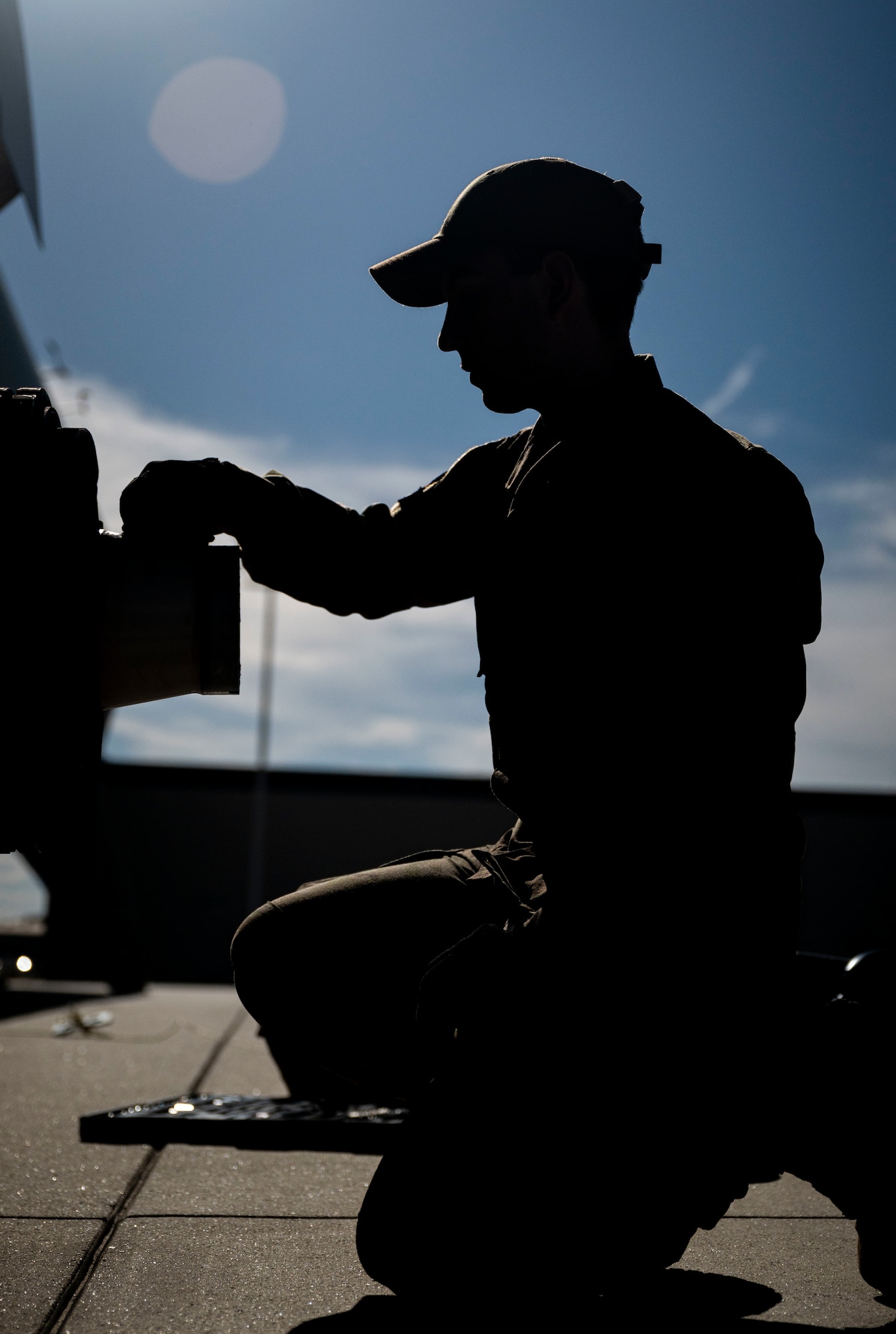 Airman 1st Class Augustus Neil, 436th Aircraft Maintenance Squadron crew chief, wipes a C-5M Super Galaxy wheel axle free of debris on Dover Air Force Base, Delaware, Feb. 15, 2023. The creation of the 436th Mission Generation Group includes the 436th Logistics Readiness Squadron to better support maintenance squadrons and realign unit priorities under a mission generation culture. (U.S. Air Force photo by Staff Sgt. Marco A. Gomez)