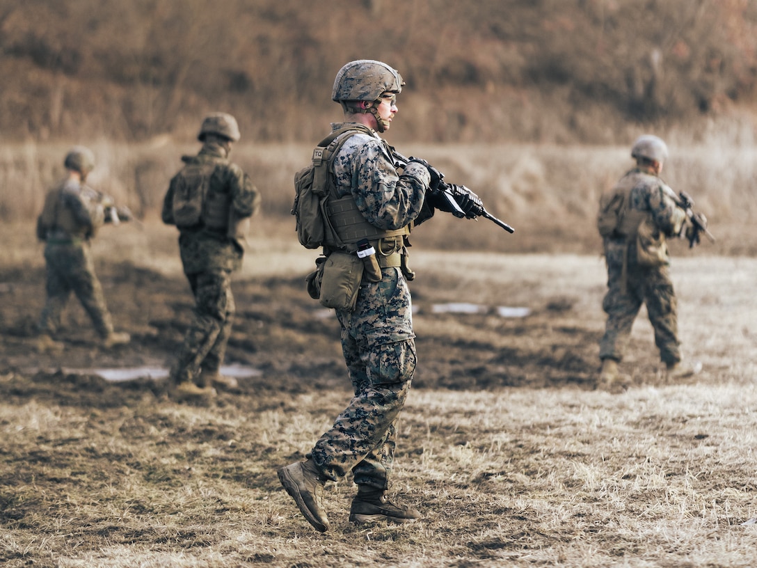 U.S. Marine Corps Sgt. Ethan Jarn, a native of East Bethel, Minnesota and an ammunition technician with III Marine Expeditionary Force Support Battalion, III Marine Expeditionary Force Information Group, maneuvers his fire team on an Infantry Battle Platoon Course during a live fire range on U.S. Army Garrison Casey, Gyeonggi, South Korea, Feb. 10, 2023. III MSB is conducting Bushido Strike 23, which comprises training events including a Marine Corps Combat Readiness Evaluation in South Korea to validate its mission essential tasks of providing combat service, security and administrative services to III Marine Expeditionary Force.