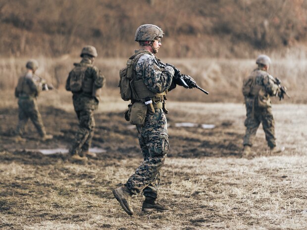 U.S. Marine Corps Sgt. Ethan Jarn, a native of East Bethel, Minnesota and an ammunition technician with III Marine Expeditionary Force Support Battalion, III Marine Expeditionary Force Information Group, maneuvers his fire team on an Infantry Battle Platoon Course during a live fire range on U.S. Army Garrison Casey, Gyeonggi, South Korea, Feb. 10, 2023. III MSB is conducting Bushido Strike 23, which comprises training events including a Marine Corps Combat Readiness Evaluation in South Korea to validate its mission essential tasks of providing combat service, security and administrative services to III Marine Expeditionary Force.