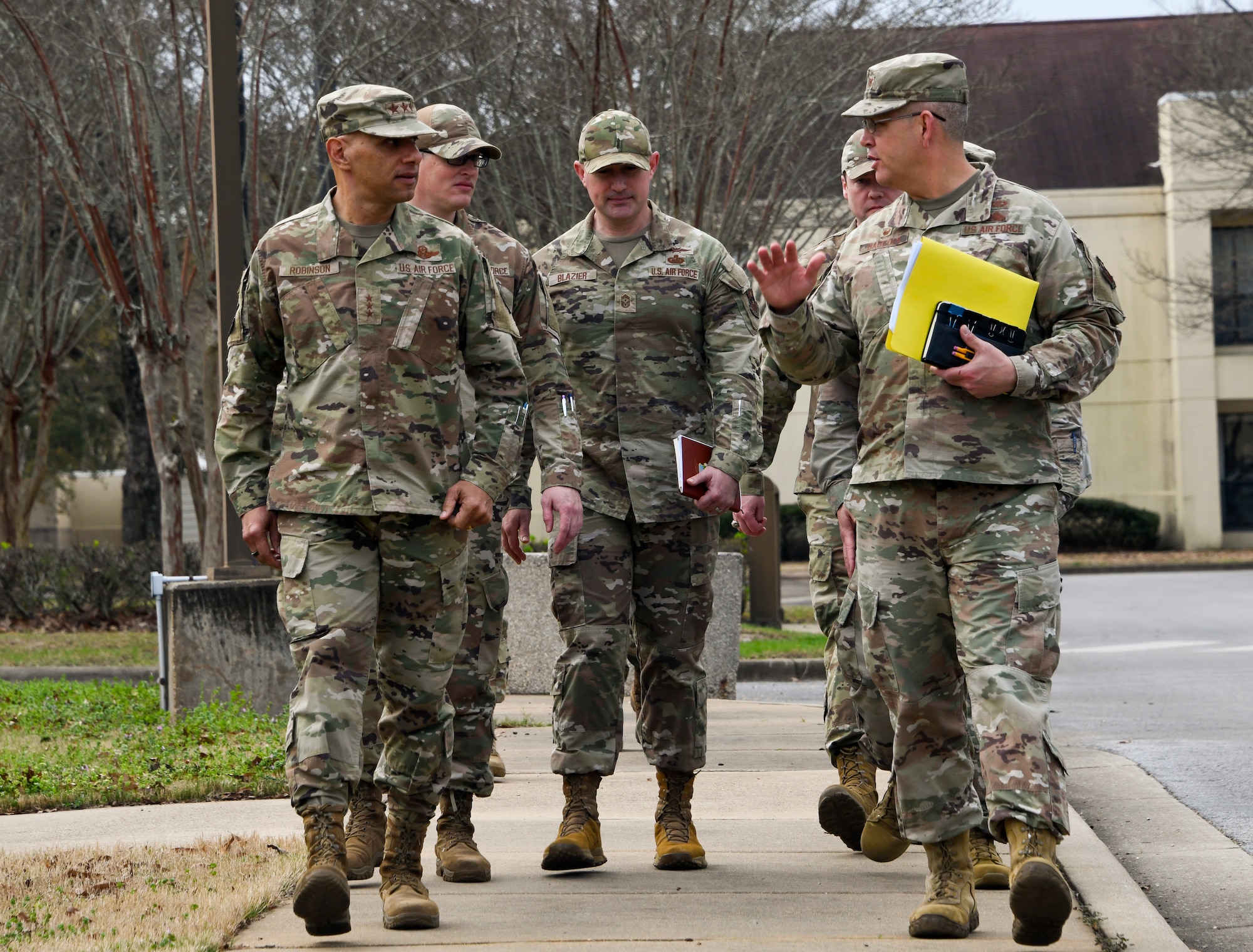 Lt. Gen. Brian Robinson, commander of Air Education and Training Command, walks with Col. Anthony Babcock, Barnes Center for Enlisted Education commander, during a visit to Maxwell Air Force Base, Alabama, Feb. 23, 2023. (U.S. Air Force photo by Brian Ferguson)