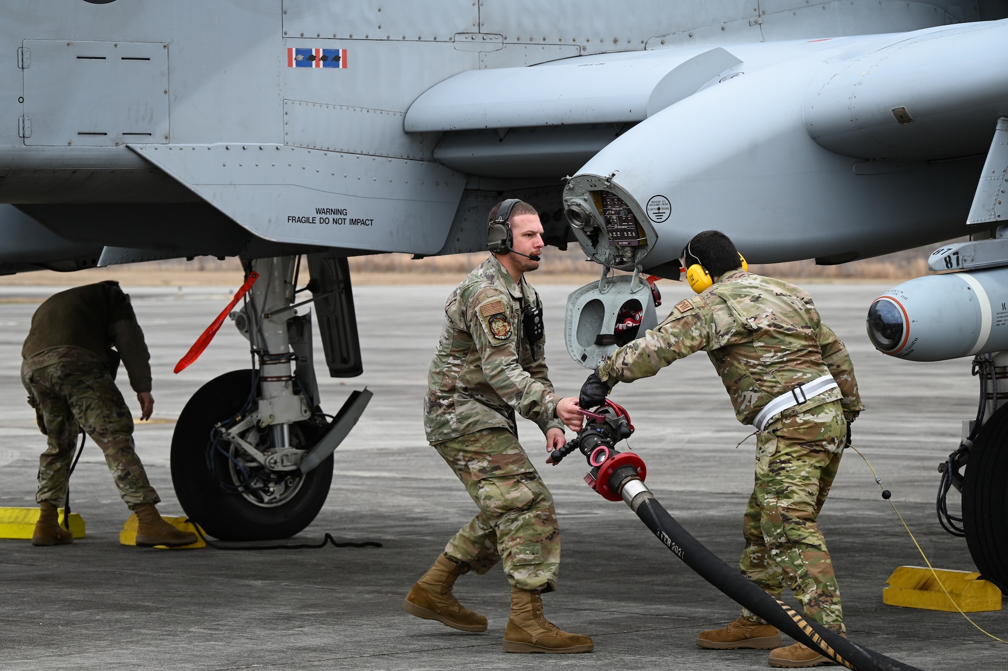 U.S. Airmen from the 175th Wing, Maryland Air National Guard, refuel an A10-C Thunderbolt II during an integrated combat turn (ICT) at Hunter Army Airfield, Georgia, on Jan. 25, 2023.