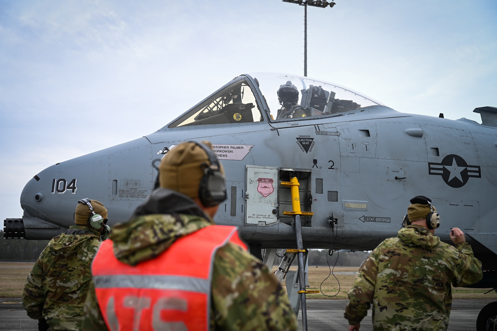 A U.S. Air Force A-10C Thunderbolt II pilot from the 104th Fighter Squadron, Maryland Air National Guard, arrives at Hunter Army Airfield, Georgia, Jan. 25, 2023 to be refueled and rearmed during an integrated combat turn (ICT).