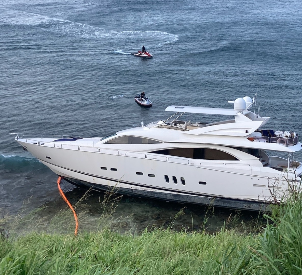 The Coast Guard is responding to a 94-foot motor yacht that grounded off the north side of Honolua Bay, Maui, Monday.