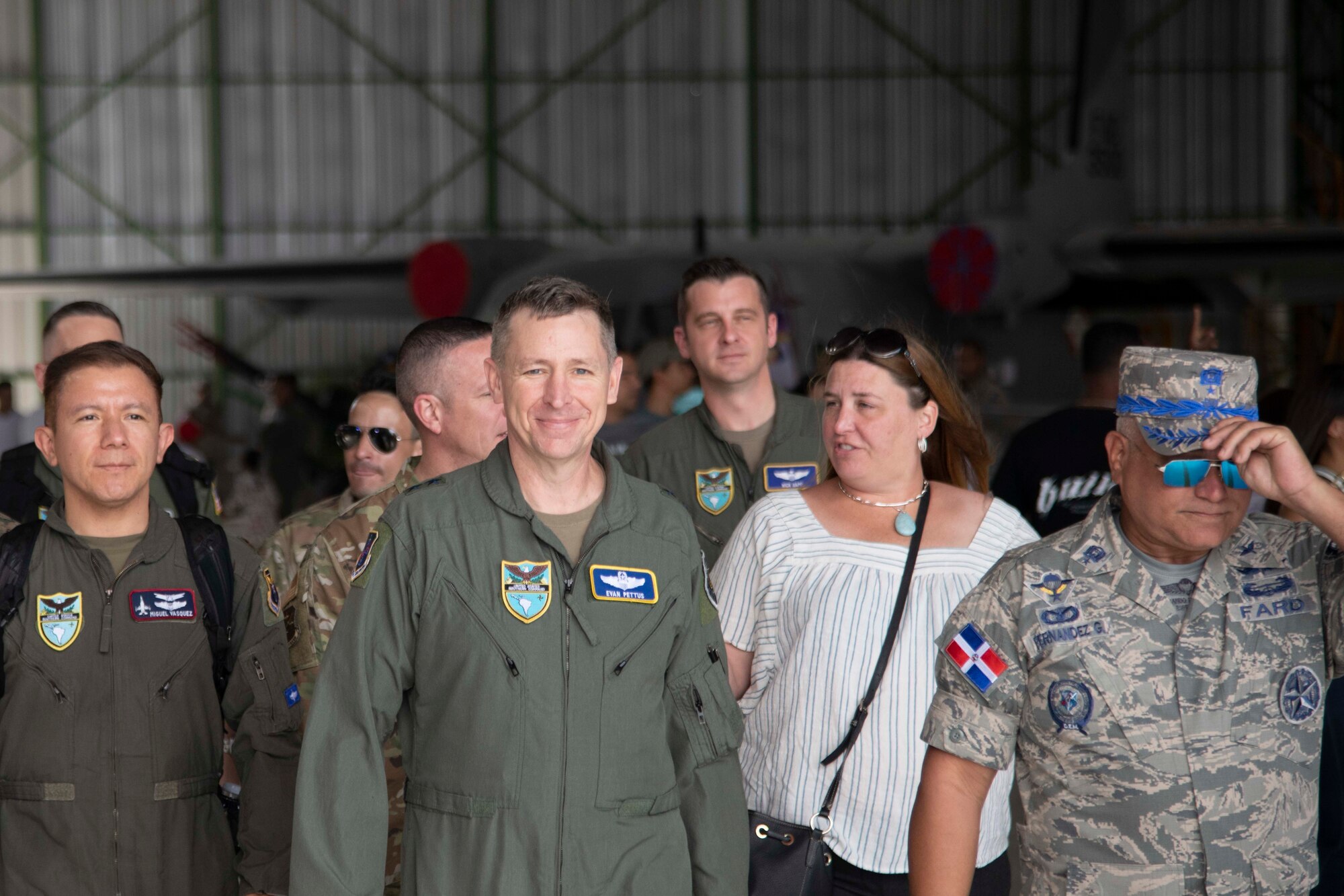 Commander walks through hanger