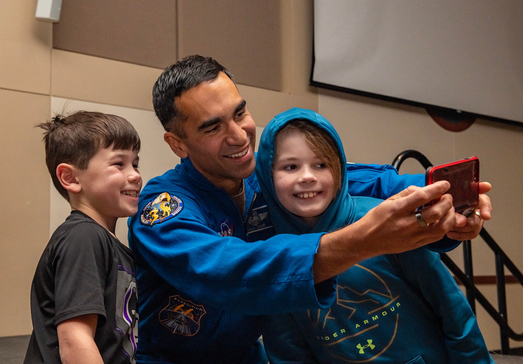 Astronaut take selfie with children