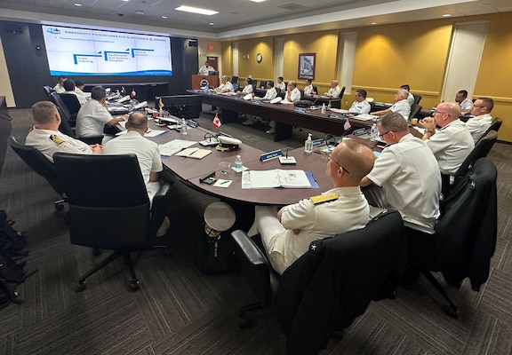 Allied submarine force commanders listen to national briefs during the 2nd annual Submarine Conference of the Americas (SCOTA) at U.S. Southern Command in Miami, Florida, Feb. 14, 2023.
