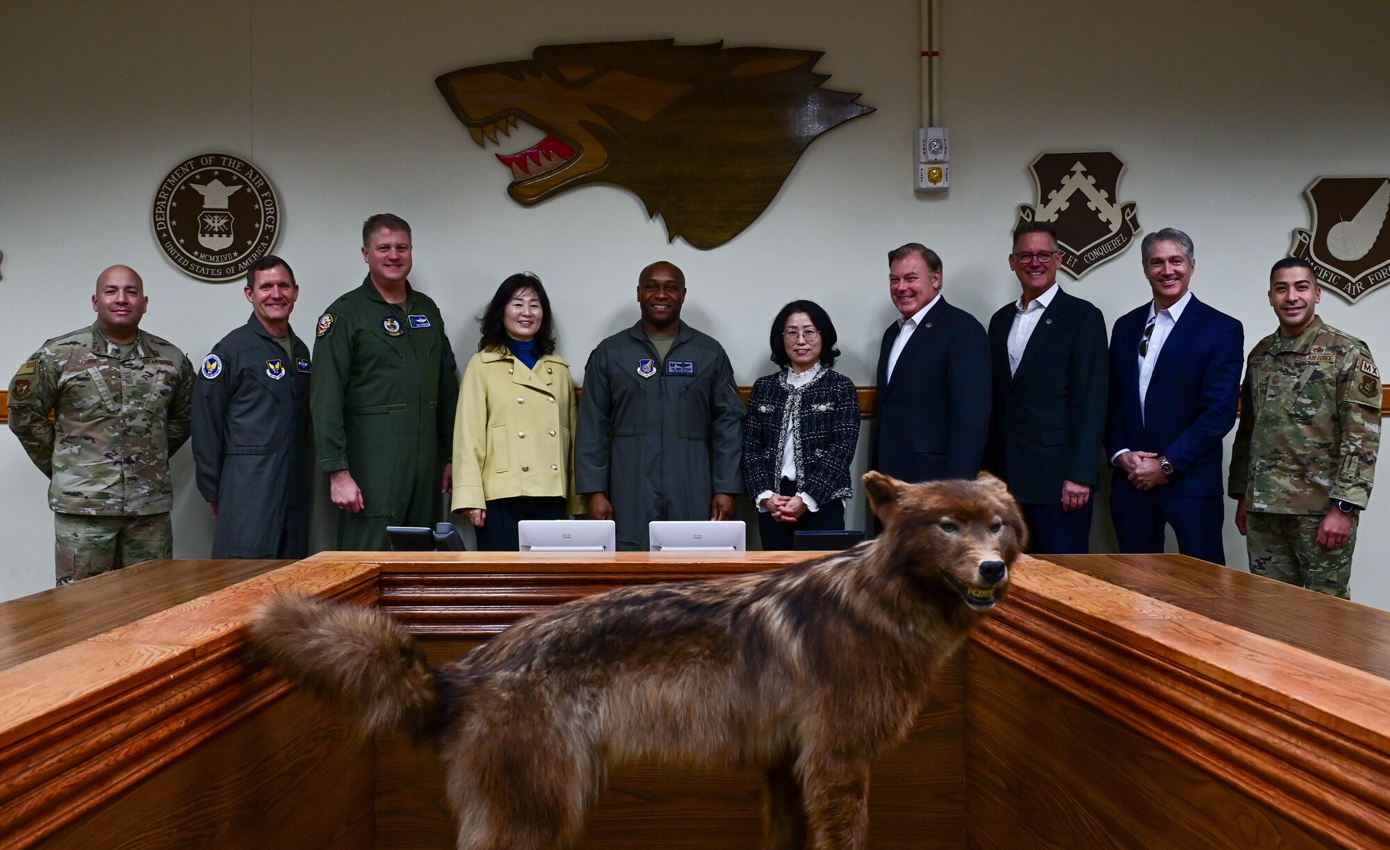 Speakers for the inaugural Wolf Leadership Forum take a photo, at Kunsan Air Base, Republic of Korea, Feb. 23, 2023. The inaugural Wolf Leadership Forum gathered previous leaders of the Wolf Pack. (U.S. Air Force photo by Senior Airman Shannon Braaten)