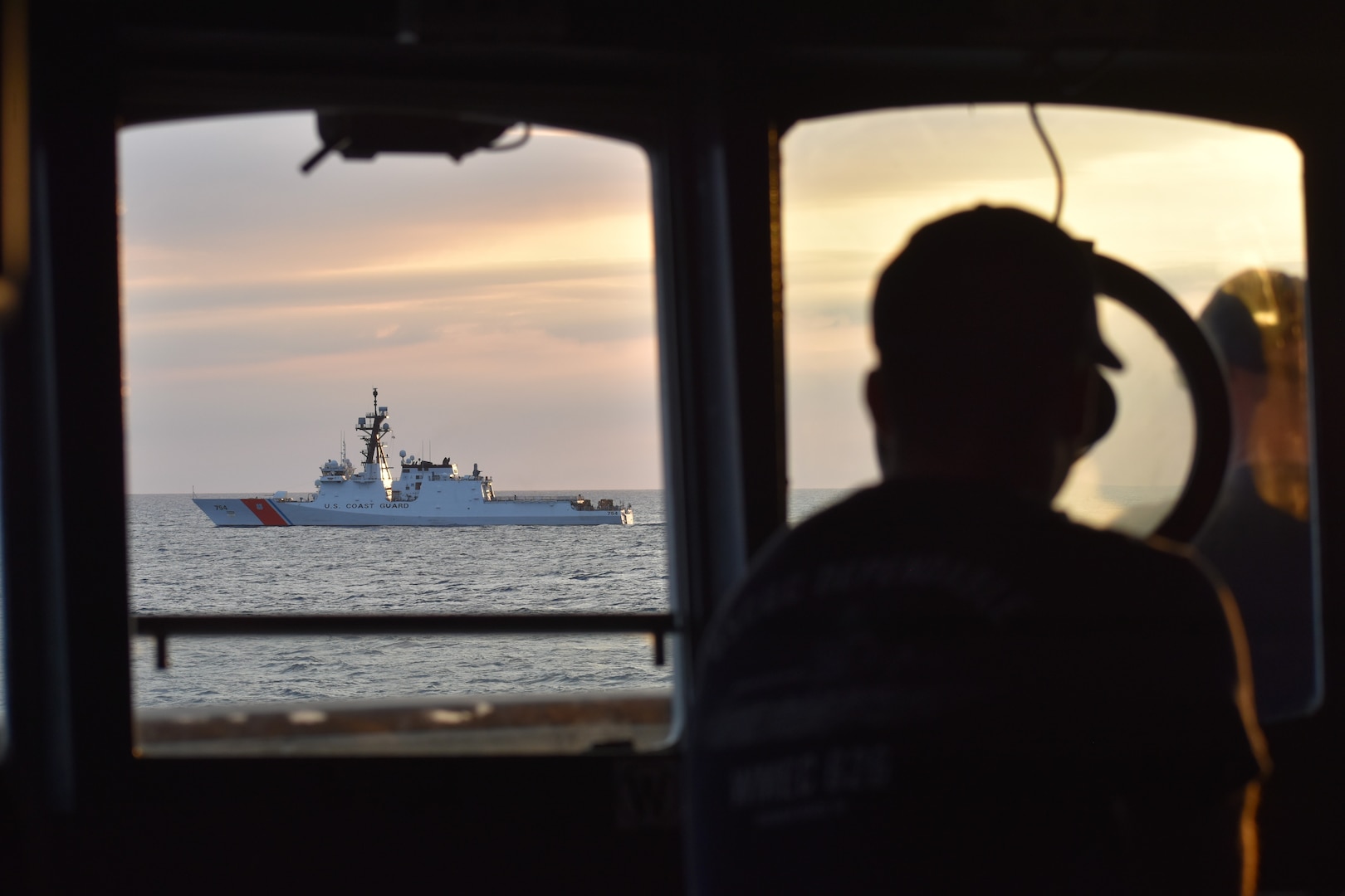 USCGC Dependable’s (WMEC 626) crew operates alongside USCGC James (WMSL 754) in support of Operation Vigilant Sentry in the Florida Straits off the coast of Key West, Florida, Jan. 21, 2023. Dependable’s crew patrolled the Coast Guard’s Seventh District area of operations to conduct maritime safety and security missions. (U.S. Coast Guard photo by Fireman Olliver Miller)