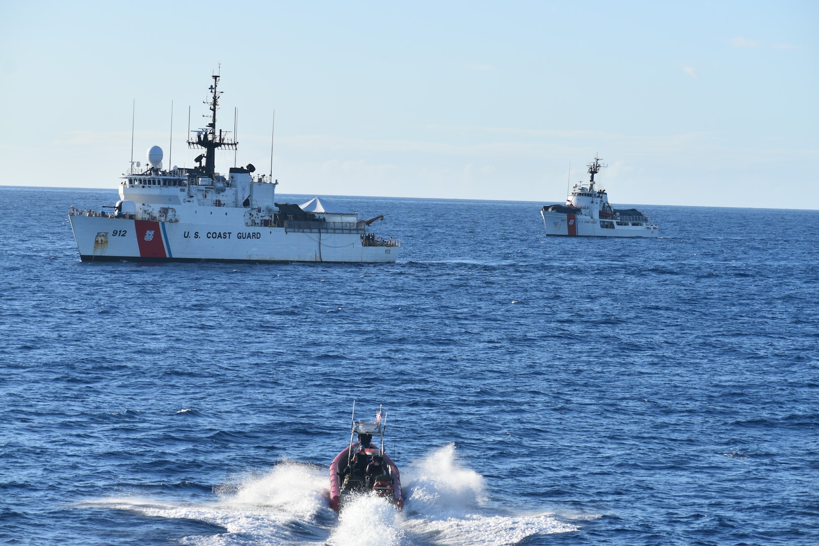 A USCGC Dependable (WMEC 626) small boat crew operates alongside USCGC Legare (WMEC 912) and USCGC Valiant (WMEC 621) in support of Operation Vigilant Sentry off the coast of Haiti, Jan. 27, 2023. Dependable’s crew patrolled the Coast Guard’s Seventh District area of operations to conduct maritime safety and security missions. (U.S. Coast Guard photo by Ensign Hannah Jamison)