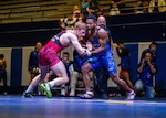 BREMERTON, WA (Feb. 24, 2023) - Coast Guard Petty Officer 2nd Class Timothy Worthen (right) of USCG Station, Marathon, Florida competes for Navy against Space Force 2nd lt. Alex Saylor of Los Angeles AFB, Calif. with Team Air Force at 77 kg of the Greco-Roman Championship during the 2023 Armed Forces Wrestling Championship held at Naval Base Kitsap, Bremerton, Washington from February 25-26. This year’s championship features teams from the Army, Navy (including the Marine Corps and Coast Guard Wrestlers), and Air Force (including Space Force Wrestlers). Teams compete in Men’s Greco-Roman, Men’s Freestyle, and Women’s Freestyle wrestling styles. (Photo by Petty Officer 1st Class Ian Carver).