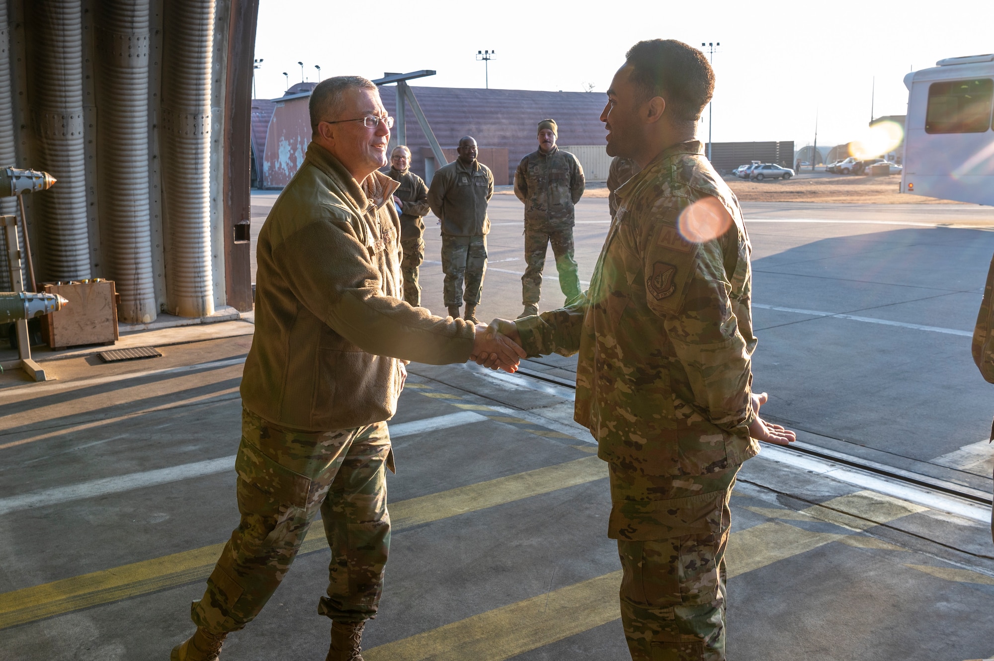 U.S. Air Force Maj. Gen. Randall Kitchens, U.S. Air Force Chief of Chaplains, coins  Staff Sgt. Carnell Caster, 36th Fighter Generation Squadron dedicated crew chief, for his exemplary performance as a wingman and leader at Osan Air Base, Republic of Korea, Feb. 21, 2023. Caster was coined by Kitchens for his exemplary performance as a wingman and a leader. (U.S. Air Force photo by Airman 1st Class Aaron Edwards)