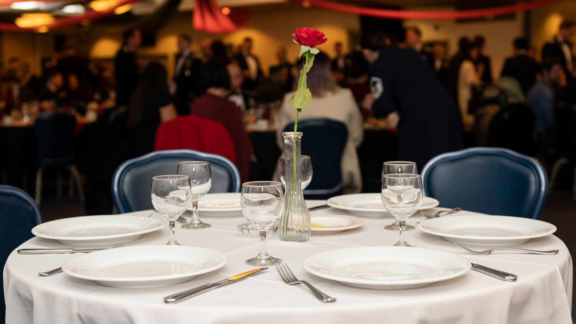 A reserved Prisoner of War/Missing in Action table sits empty at the 2023 Annual Awards Ceremony at Yokota Air Base, Japan, Feb. 24, 2023.