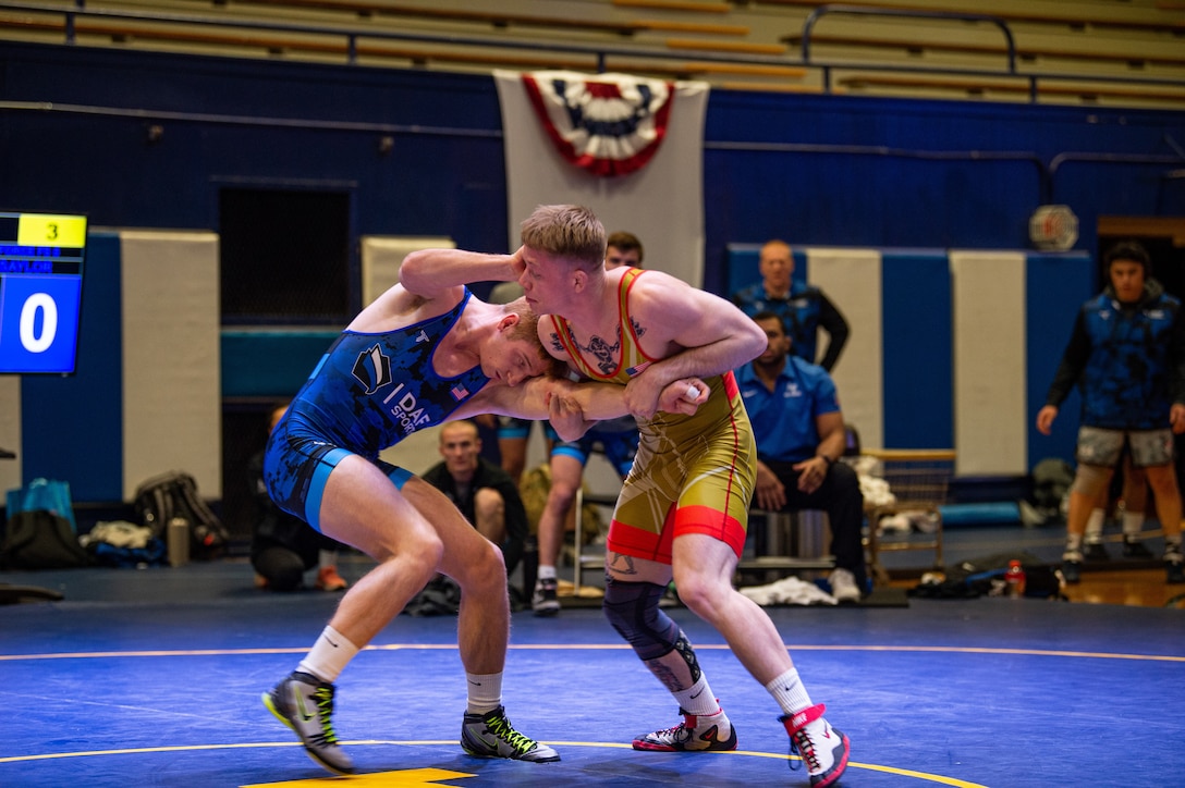SPC Britton Holmes (U.S. Army) controls the tie against Timothy Worthen (U.S. Navy team/USCG) in 74 kg freestyle match at the 2023 Armed Forces Championships. Photo by Petty Officer 1st Class Ian Carver.