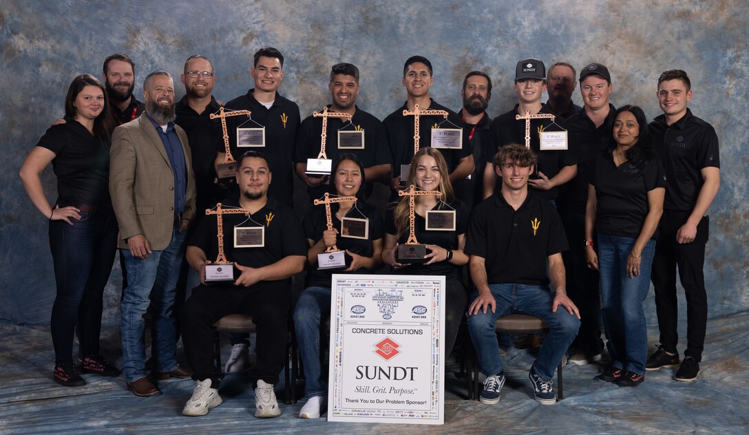 Taylor Brown, student trainee with the U.S. Army Corps of Engineers Los Angeles District, front row, second from left, along with her teammates, holds up her trophy she won as a member of the Arizona State University Concrete Solutions team during the Associated Schools of Construction Regions 6 and 7 Student Competition and Construction Management Conference Feb. 7-10 near Reno, Nevada. Brown will graduate from the university in May with a degree in concrete engineering. She plans to remain with the Corps’ LA District as a Department of the Army intern.