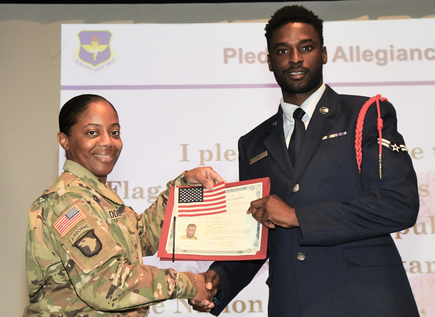Airman accepts certificate
