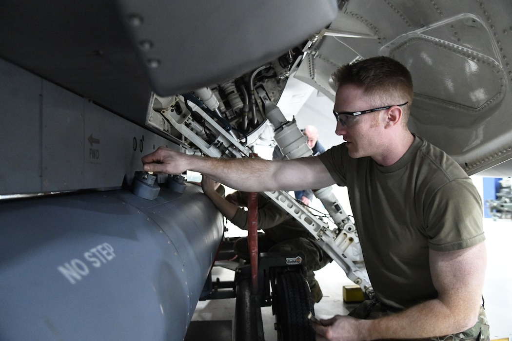 Fighter Aircraft Integrated Avionics specialists assigned to the 148th Fighter Wing, Minnesota Air National Guard, install an AN/ASQ-236 radar pod on January 25, 2023. The 148th Fighter Wing has been designated as the Air National Guard’s Center for Excellence for all F-16 fighter aircraft.