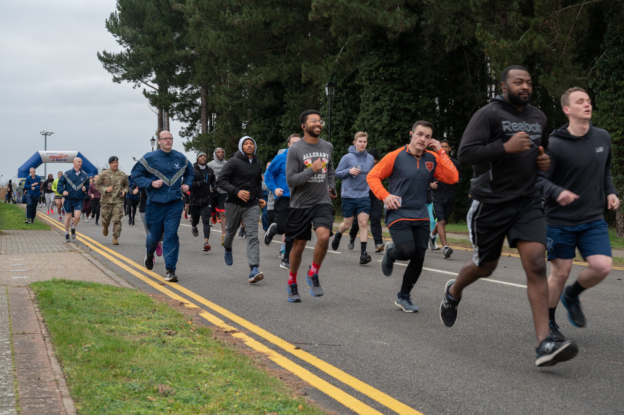 U.S. Air Force service members, spouses and family, start the first section of the Black History Month 5K run and walk, Feb. 23, 2023, at Royal Air Force Mildenhall, England.
