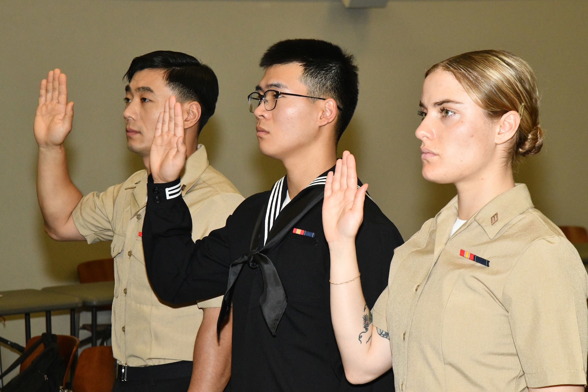 Service members accept the Oath of Allegiance