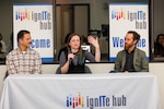 Naval Surface Warfare Center, Carderock Division employees (from left): Mechanical engineer Mark Melendez, Capital Tech Bridge Director Lauren Hanyok and science and technology photographer Ryan Hanyok give insights into what it took to build and test NASA's Orion Capsule model during Montgomery College's IgnITe Hub program event in Montgomery County, Md., on Feb. 6. (U.S. Navy photo by Aaron Thomas)