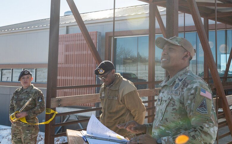 Commander makes opening remarks outside of new vcc building