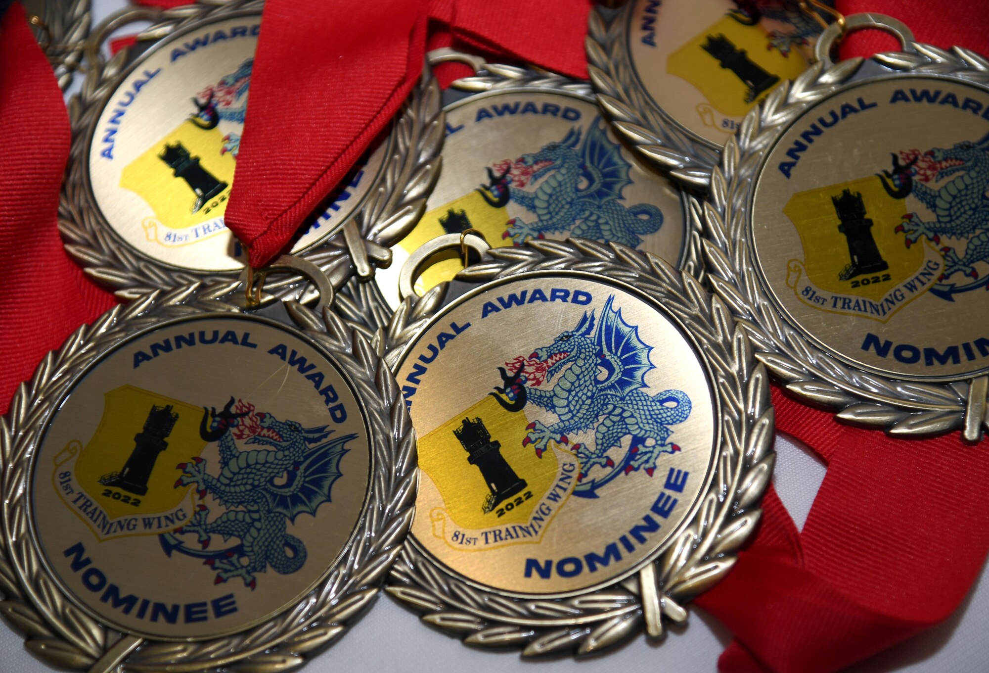 Medallions are on display during the 81st Training Wing's 2022 Annual Awards Ceremony inside the Bay Breeze Event Center at Keesler Air Force Base, Mississippi, Feb. 24, 2023.